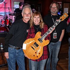 Close up with Joel Edison and Teresa Tucker and her new Jam4Dan9 Guitar, Jennifer! (FYI, Jennifer was named after Dan's daughter.)